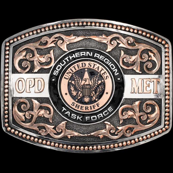 Commemorate your service with the Fort Sam Houston Custom Belt Buckle.  Featuring copper scrollwork on a silver matted base and a custom sheriff logo. Personalize this belt buckle today!